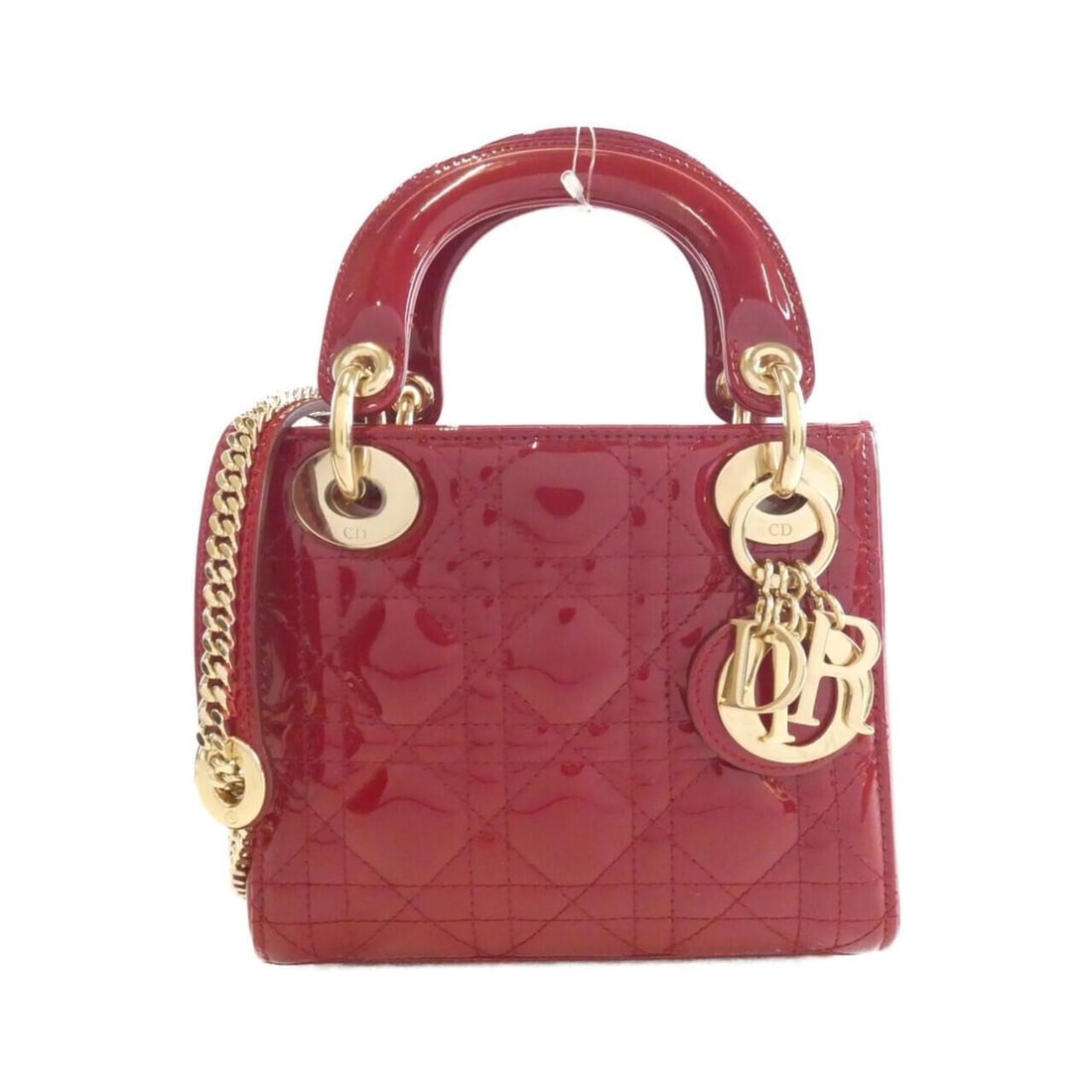 Christian Dior Lady Mini M0505OVRB Handbag: --- Catalog ---Category: SizeSize (HxWxD): 14cm x 17cm x 7cm / 5.51'' x 6.69'' x 2.75''Category: DesignType: HandbagColor: Cherry redGender: WomenMaterial: Leather Leather/Fur Type: Enamel