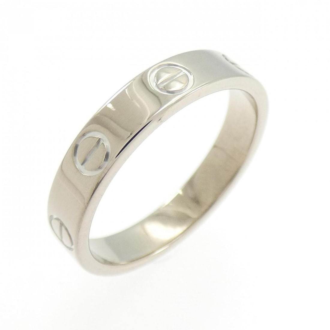 Cartier Mini Love Ring: --- Catalog ---Category: SizeUS Size: 6Brand Size: 51Category: DesignType: Band ringColor: White goldGender: WomenMaterial: White gold (18K)Category: GeneralMPN: B4085100Brand: Cartier--- Item List --