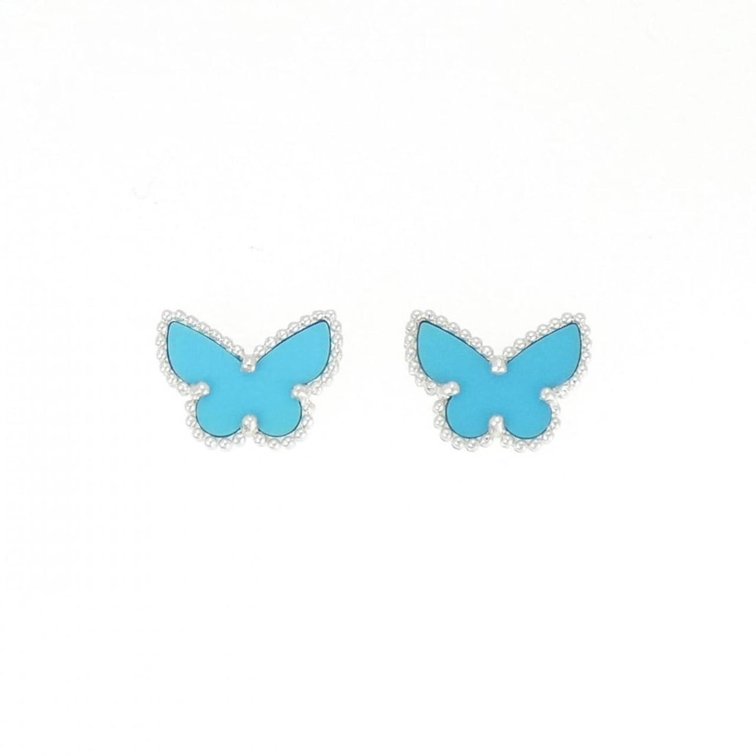 Van Cleef & Arpels Sweet Alhambra Papillon Earrings: --- Catalog ---Category: SizeSize (HxWxD): 10.70mm x 7.90mm / 0.42'' x 0.31''Category: DesignType: Stud earringsColor: White goldStone: TurquoiseGender: WomenMaterial: White gold (18K)Category:
