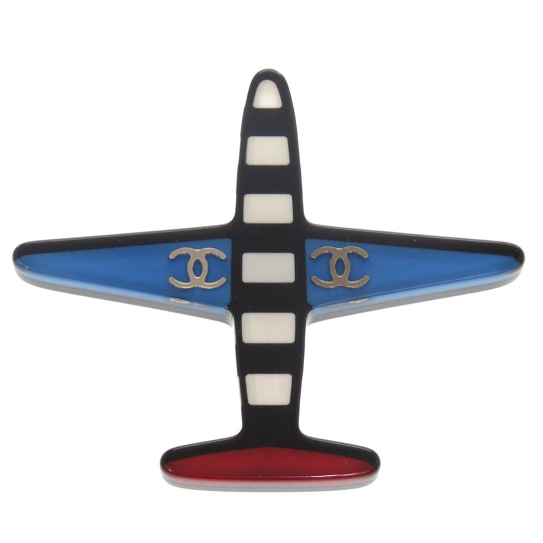 Excellent condition Chanel airplane Coco mark plastic brooch in blue, black, white, and red. 1361: --- Catalog ---Category: SizeSize (HxWxD): 6.8cm x 6.8cm / 2.67'' x 2.67''Category: DesignType: BroochColor: Black, Blue, WhiteGender: WomenMaterial: PlasticCategory: GeneralBrand: ChanelCountry of Or