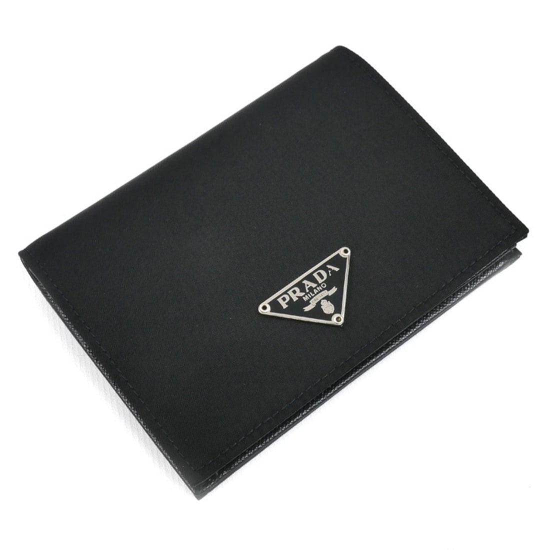 PRADA Prada Bifold Wallet Black M204 Women's: --- Catalog ---Category: SizeSize (HxWxD): 8.5cm x 11cm x 2cm / 3.34'' x 4.33'' x 0.78''Category: DesignType: Wallet (bi-fold)Color: BlackGender: WomenMaterial: Nylon , Leather Category: GeneralMPN: M