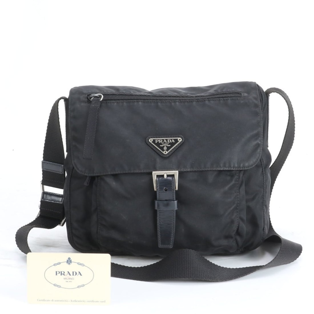 Prada Tessuto Nylon Triangle Logo Leather Shoulder Bag Messenger Black Men's: --- Catalog ---Category: SizeSize (HxWxD): 22cm x 25cm x 10cm / 8.66'' x 9.84'' x 3.93''Category: DesignType: Shoulder bagColor: BlackGender: MenMaterial: Nylon , Leather Category: GeneralBrand: Prada