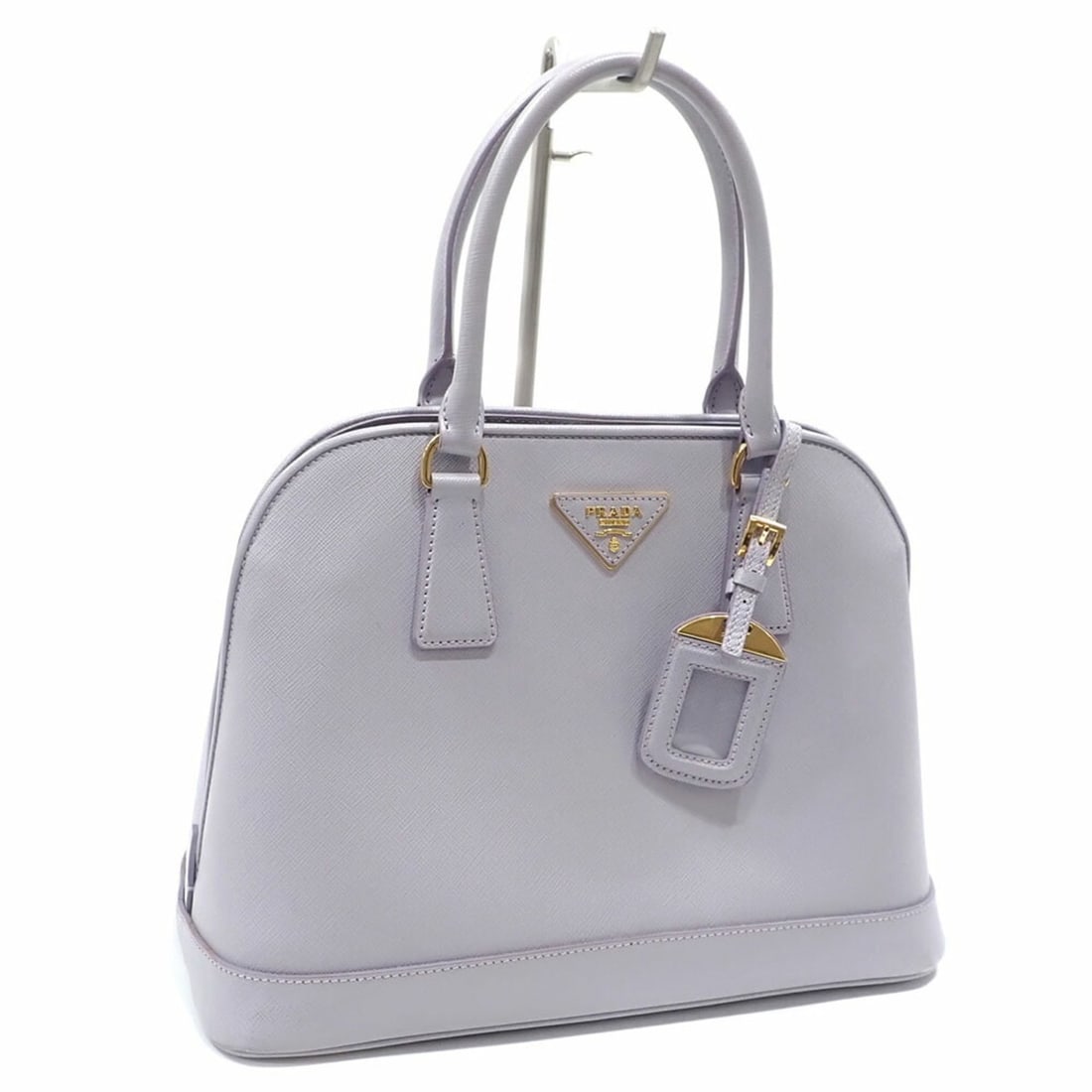 Prada handbag for women, light purple leather shoulder bag: --- Catalog ---Category: SizeSize (HxWxD): 22.5cm x 30cm x 14cm / 8.85'' x 11.81'' x 5.51''Category: DesignType: Handbag, Shoulder bagColor: Light purpleGender: WomenMaterial: Leather Category: Genera
