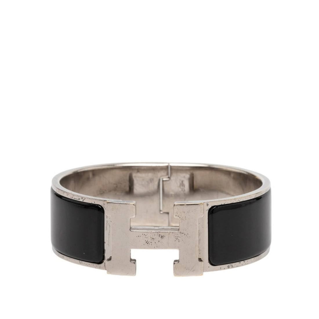 Hermes Click-Clack H PM Bangle in Silver, Black Metal, and Enamel for Women: --- Catalog ---Category: SizeLength: 16cm / 6.29''Category: DesignType: BangleColor: BlackGender: WomenMaterial: EnamelCategory: GeneralBrand: Hermes--- Item List ---Section: ConditionRanking: Rank AB