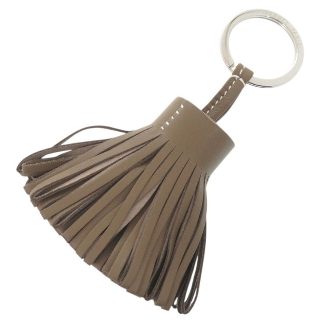 Like new Hermès accessory bag charm, fringe, Carmen Anjou Miro etoupe, double-stamped (2024),: --- Catalog ---Category: SizeSize (HxWxD): 12cm x 5cm / 4.72'' x 1.96''Category: DesignType: KeyringColor: Etoupe grayGender: Women,MenMaterial: Agneau MiloCategory: GeneralBrand: HermesCountry of Ori