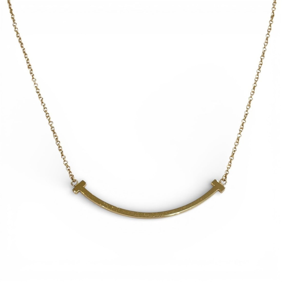 Tiffany & Co. Au750 18K T Smile Small Necklace in Pink Gold for Women: --- Catalog ---Category: SizeNeck Circumference: 46 cm / 18.11''Category: DesignColor: Pink goldGender: WomenMaterial: Pink gold (18K)Necklace Type: NecklaceCategory: GeneralBrand: Tiffany--- Item Lis