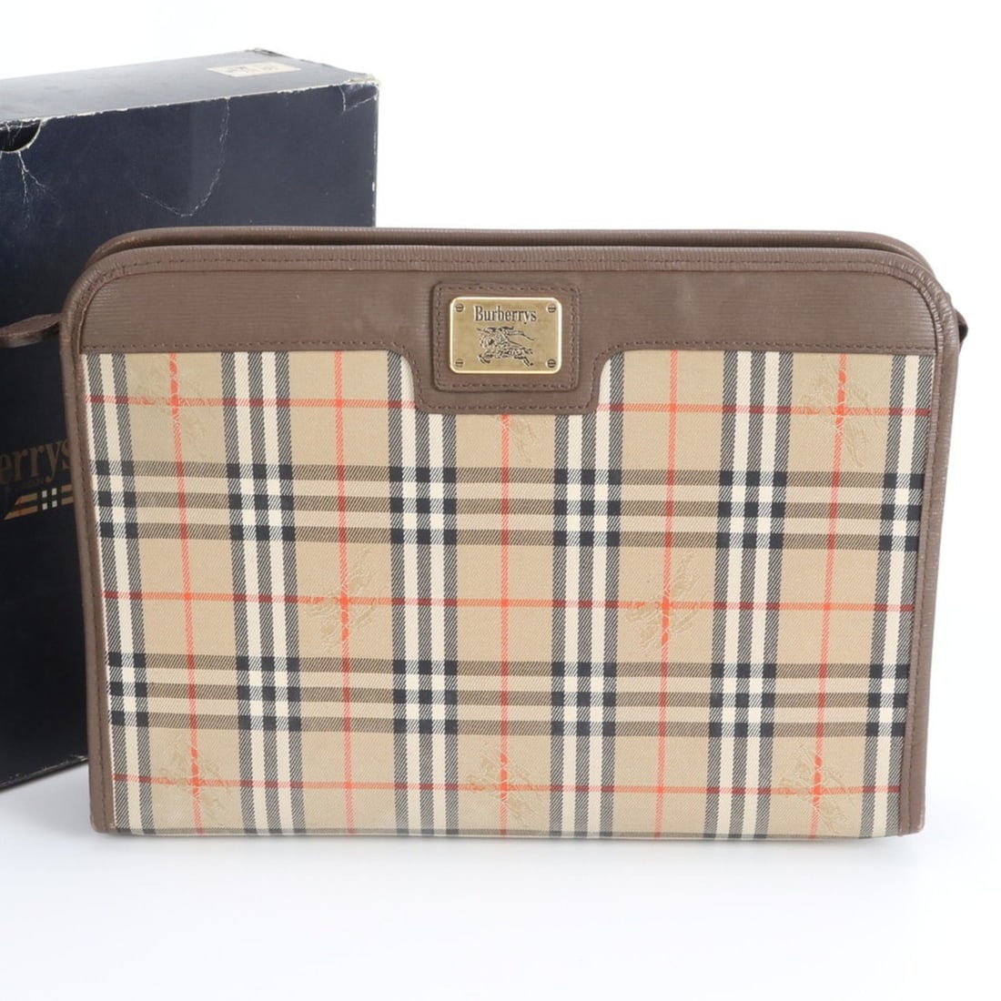 Burberry Nova Check Leather Second Bag Clutch Pouch Brown Men's: --- Catalog ---Category: SizeSize (HxWxD): 18cm x 25cm x 5cm / 7.08'' x 9.84'' x 1.96''Category: DesignType: PouchColor: BrownGender: MenMaterial: Leather , Canvas Category: GeneralBrand: Burberry---
