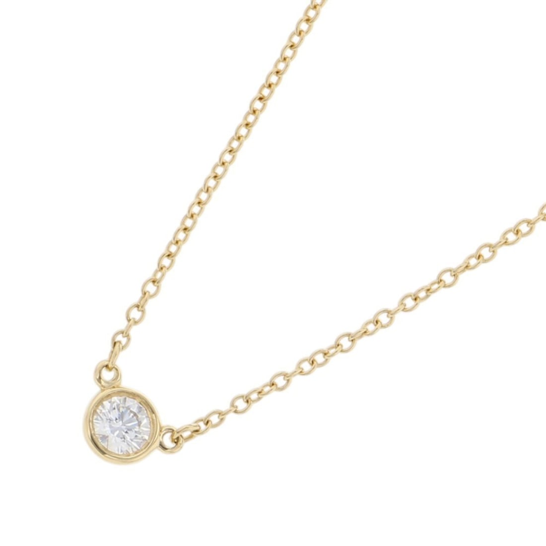 Tiffany & Co. Elsa Peretti By the Yard Single Diamond Pendant Necklace with 1 (approx. 0.17ct) in: --- Catalog ---Category: SizeWeight: 1.8g / 0.06oz.Diameter: 4.4mm / 0.17''Neck Circumference: 40.5 cm / 15.94''Category: DesignStone: DiamondGender: WomenMaterial: Yellow gold (18K)Pendant Type: Pend