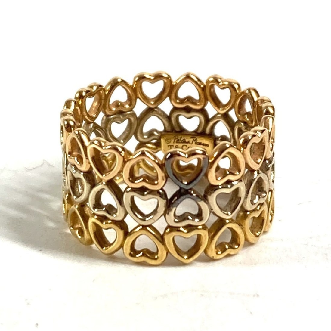 TIFFANY & Co. 18K Gold Crown of Hearts Triple Heart Ring, Au750, Women's,: --- Catalog ---Category: SizeJP Size: 8US Size: 4.5Category: DesignType: Band ringColor: Gold, Pink gold, SilverGender: WomenMaterial: Gold (18K)Category: GeneralBrand: Tiffany--- Item List ---Section