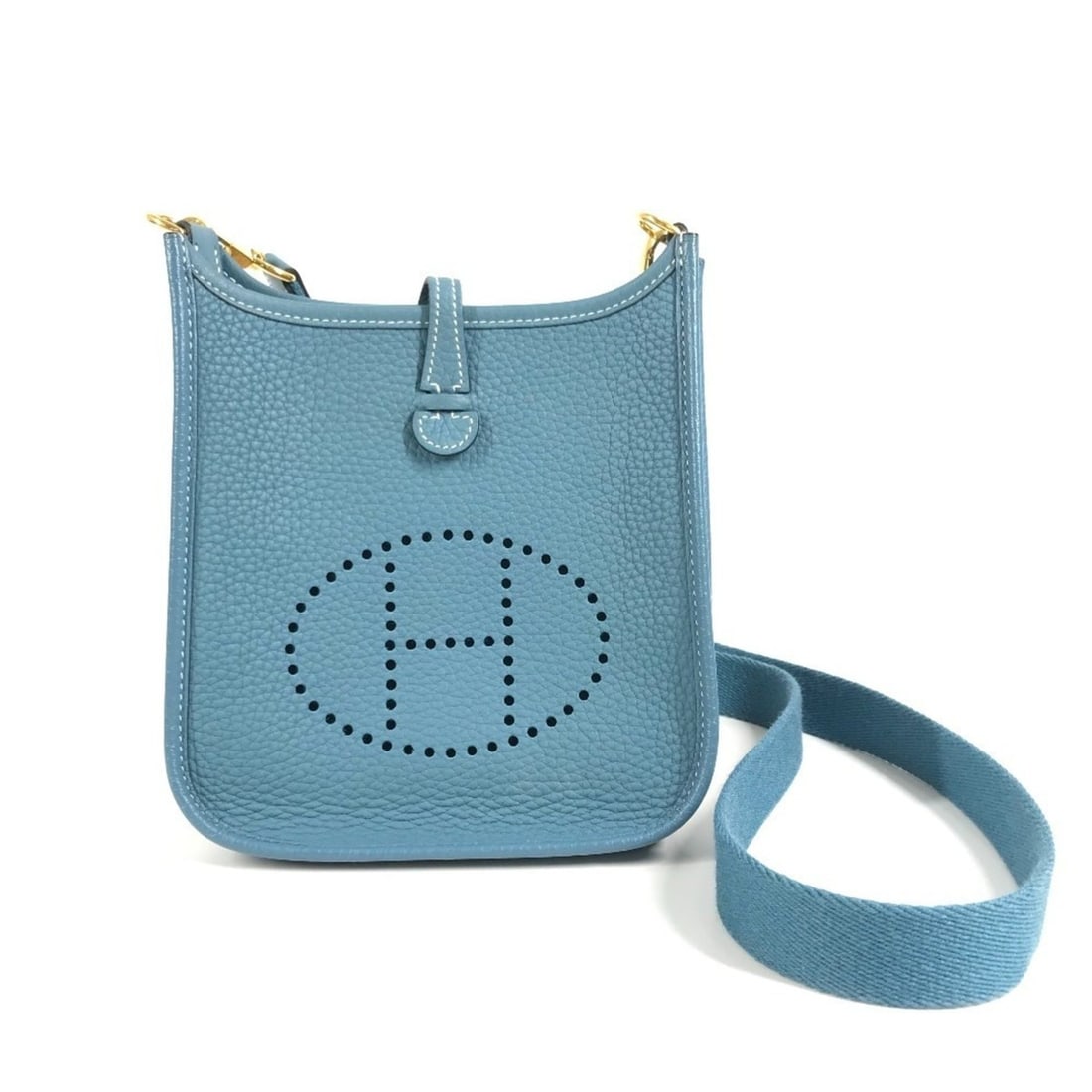 HERMES Evelyn TPM 16 Crossbody Pochette/Shoulder Bag in Taurillon Clemence Leather, New Blue Sheen: --- Catalog ---Category: SizeSize (HxWxD): 17cm x 17cm / 6.69'' x 6.69''Category: DesignType: Pochette, Shoulder bagColor: BlueGender: Men,WomenMaterial: Taurillon clemence leather Category: GeneralBr
