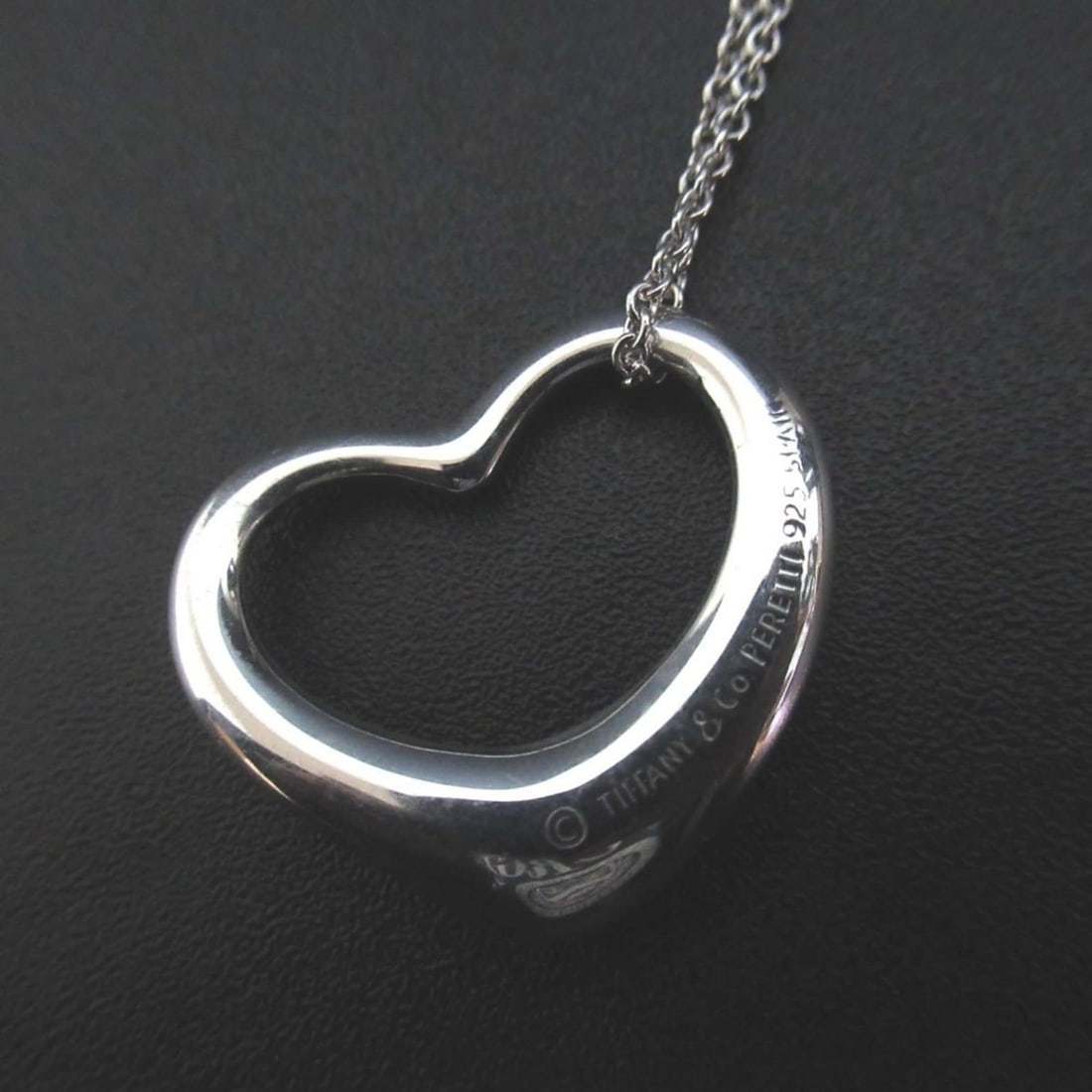 Tiffany & Co. Elsa Peretti Open Heart Large Necklace Pendant in 925 SV Silver for Women: --- Catalog ---Category: SizePendant Size: 25mm x 25mm / 0.98'' x 0.98''Neck Circumference: 46 cm / 18.11''Category: DesignColor: SilverGender: WomenMaterial: Silver 925Pendant Type: PendantNecklace T