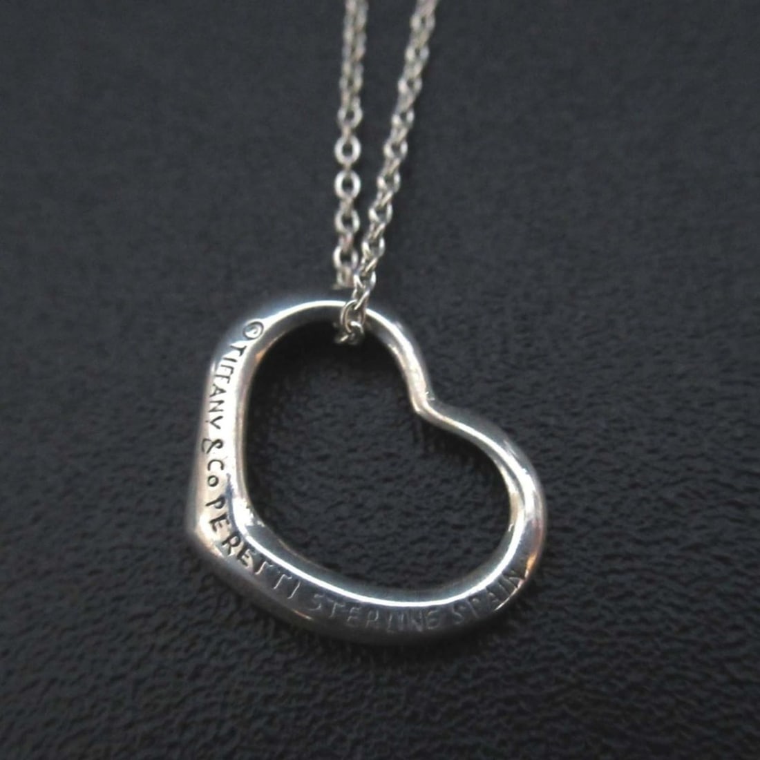 Tiffany & Co. Vintage Elsa Peretti Open Heart Necklace Pendant in Sterling Silver, Old Stamp,: --- Catalog ---Category: SizePendant Size: 12mm x 15mm / 0.47'' x 0.59''Neck Circumference: 39.5 cm / 15.55''Category: DesignColor: SilverGender: WomenMaterial: Sterling silverPendant Type: PendantNec
