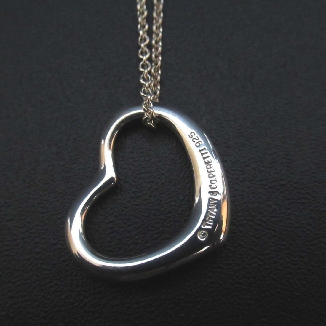 Tiffany & Co. Elsa Peretti Open Heart Necklace Pendant in 925 SV Silver for Women: --- Catalog ---Category: SizePendant Size: 20mm x 20mm / 0.78'' x 0.78''Neck Circumference: 40.5 cm / 15.94''Category: DesignColor: SilverGender: WomenMaterial: Silver 925Pendant Type: PendantNecklace