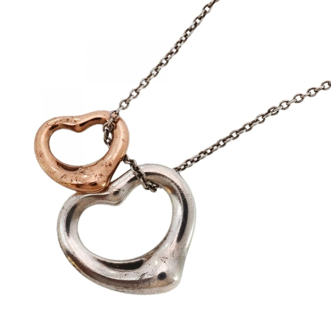 Tiffany Heart Necklace in 18KPG Pink Gold and 925 Silver for Women: --- Catalog ---Category: SizePendant Size: 14.5mm x 16mm / 0.57'' x 0.62''Neck Circumference: 41 cm / 16.14''Category: DesignGender: WomenMaterial: Pink gold (18K), Silver 925Necklace Type: NecklaceCa