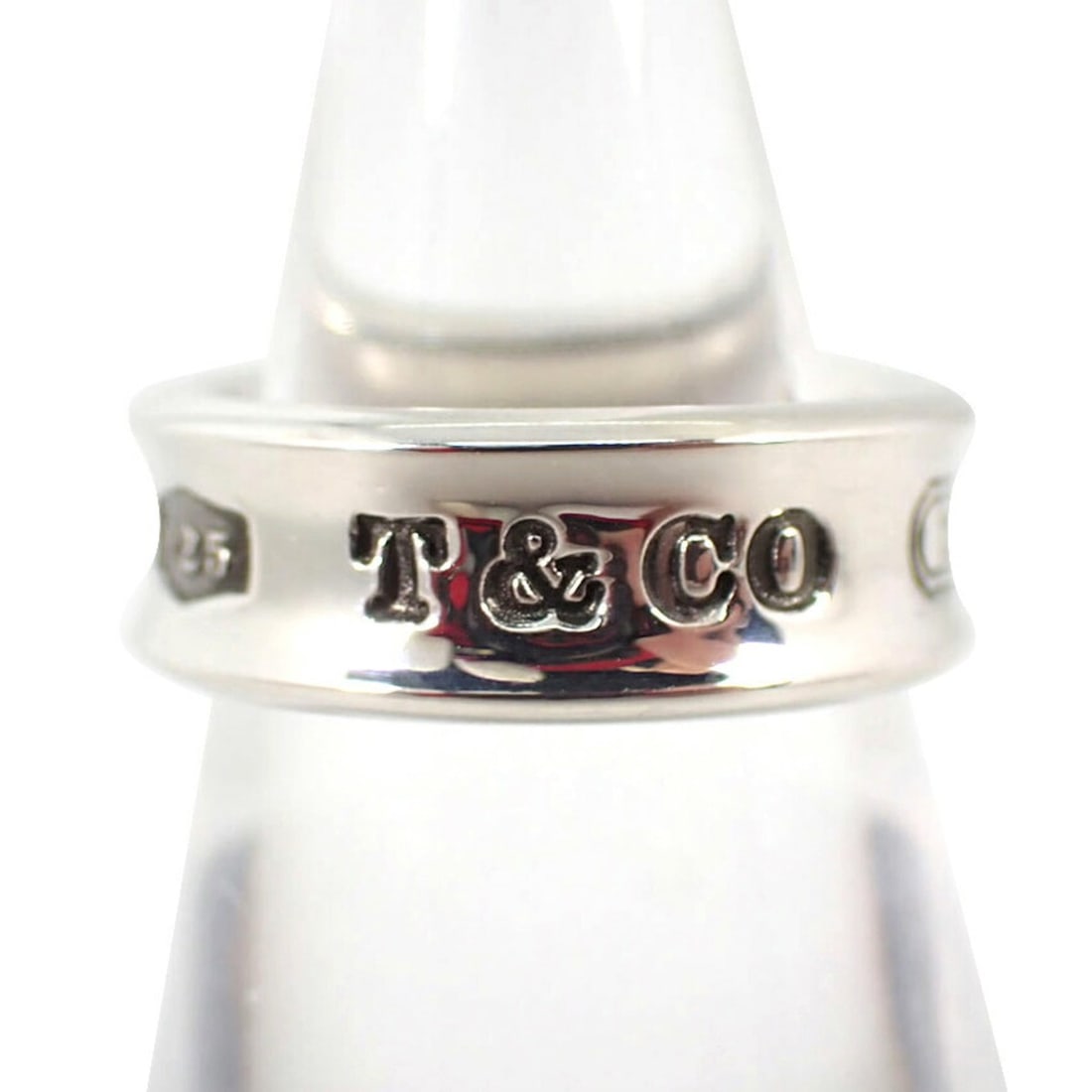 TIFFANY 925 1837 Ring, size 13.5: --- Catalog ---Category: SizeUS Size: 6.5Brand Size: 52Category: DesignType: Band ringGender: WomenMaterial: Sterling silver 925Category: GeneralBrand: Tiffany--- Item List ---Section: ConditionRankin