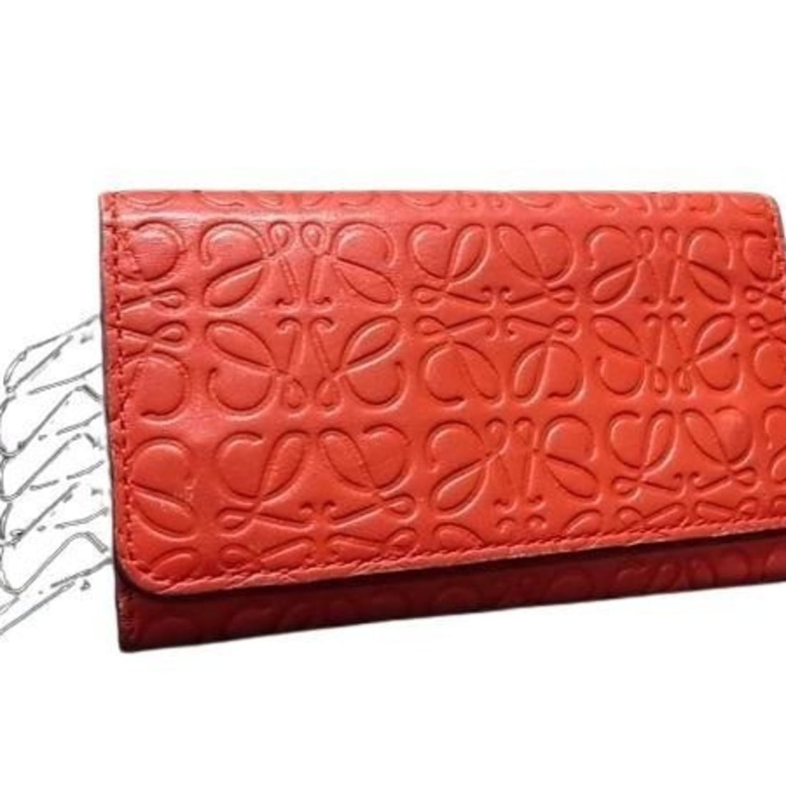 LOEWE 6-ring key case with repeat anagram in red leather for women: --- Catalog ---Category: DesignColor: Red colorGender: Men,WomenMaterial: Leather Category: GeneralBrand: LoeweCountry of Origin: SpainCategory: Physical PropertiesSize (HxWxD): 6.5cm x 11.5cm x 1.3cm