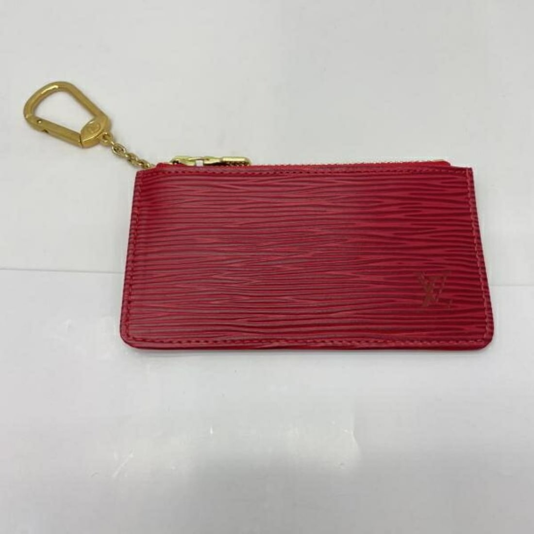 LOUIS VUITTON Pochette Cle M63807 Red Louis Vuitton: --- Catalog ---Category: SizeSize (HxWxD): 6.5cm x 12.5cm / 2.55'' x 4.92''Category: DesignType: Coin purse/coin caseColor: Red colorGender: WomenCategory: GeneralBrand: Louis Vuitton--- Item List
