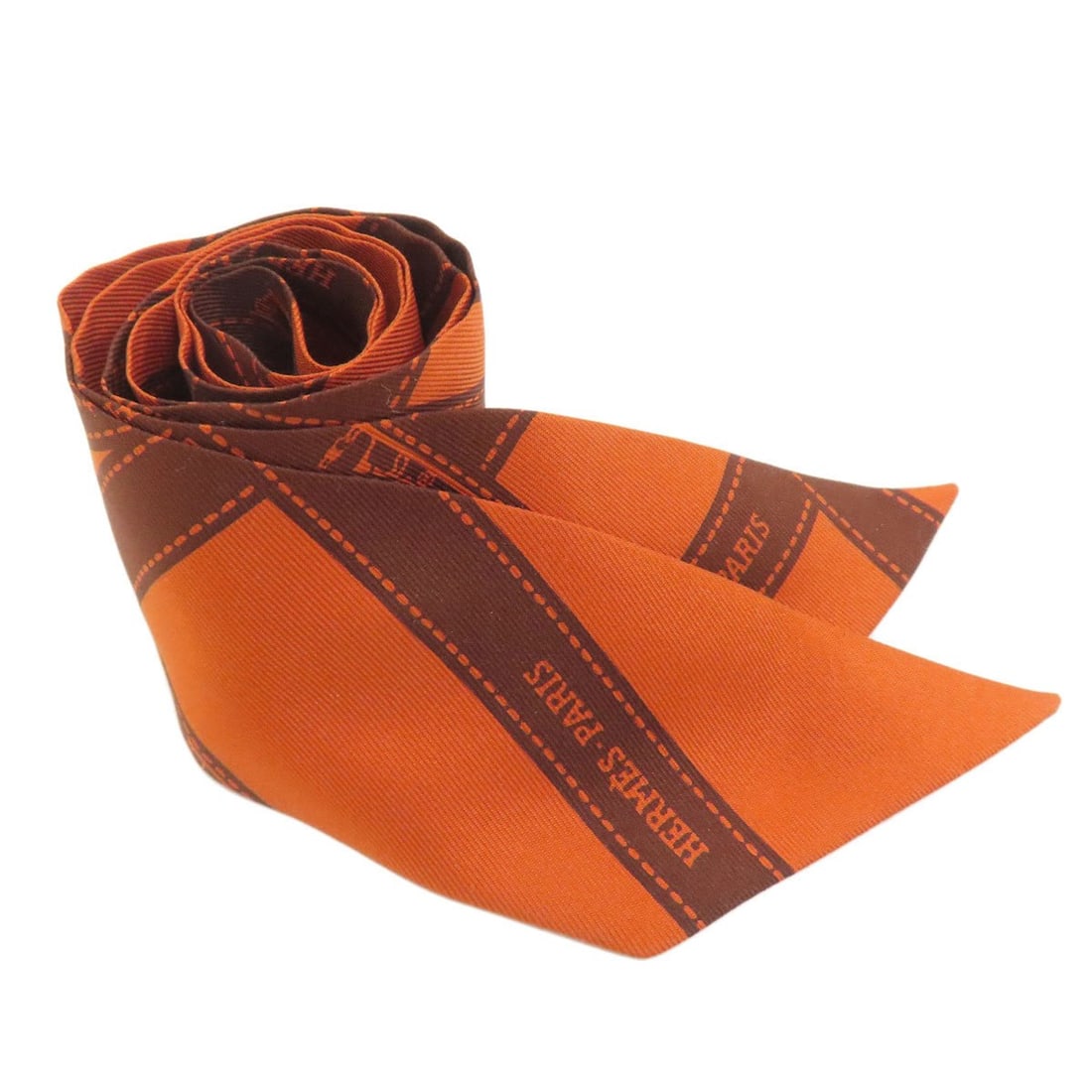 Hermes Twilly Scarf/Muffler Silk Women's HERMES: --- Catalog ---Category: SizeSize (LxW): 86cm x 5cm / 33.85'' x 1.96''Category: DesignType: ScarfColor: OrangeGender: WomenMaterial: Silk Category: GeneralLine: TwillyBrand: Hermes--- Item List ---Sec