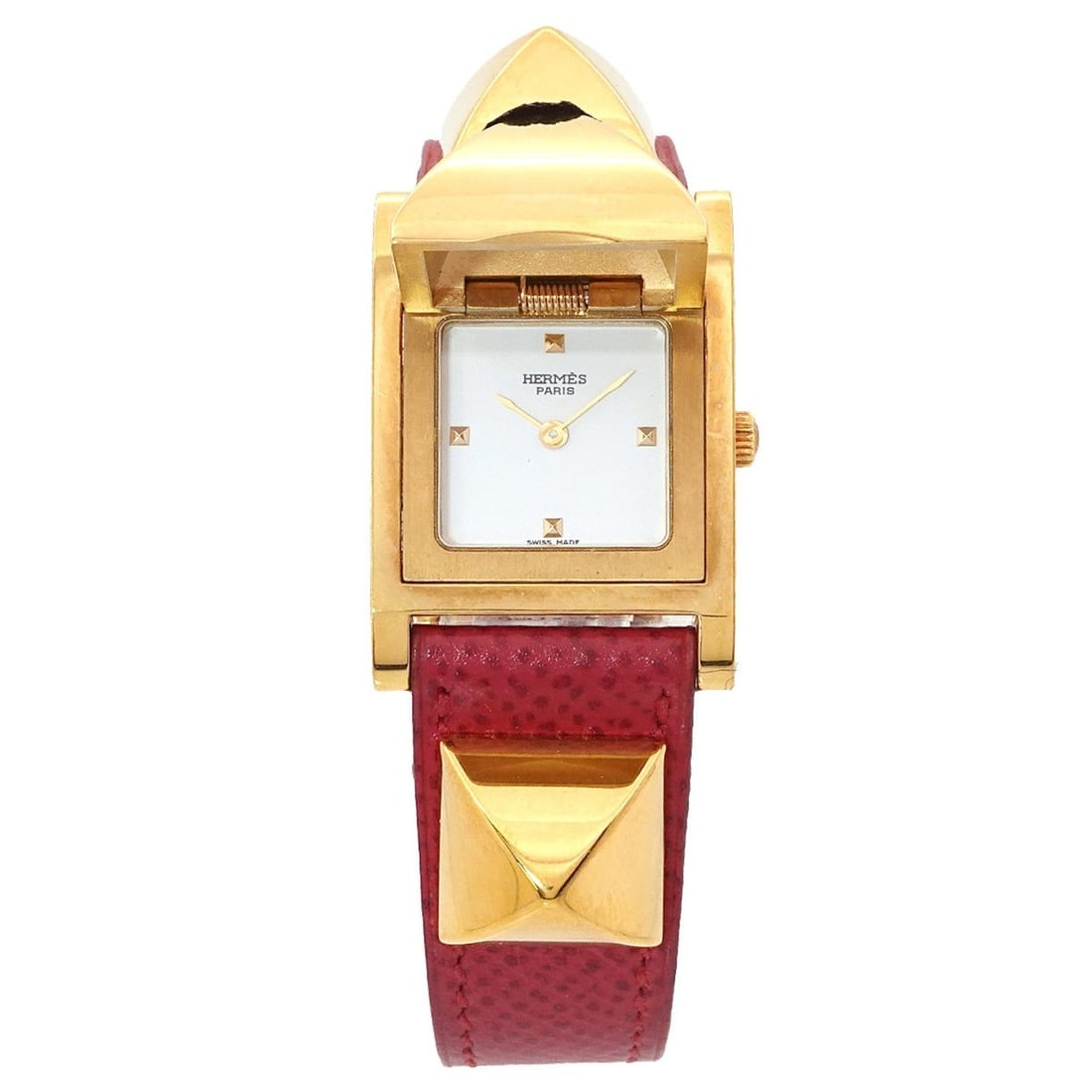 Hermès Medor Women's Pyramid Gold Stud Watch in White and Red Leather with Quartz Movement: --- Catalog ---Category: SizeWrist Size: 14cm - 16.5cm / 5.51'' - 6.49''Case Diameter: 23mm / 0.91''Category: DesignType: WristwatchGender: WomenColor (Dial): WhiteMaterial (Band): Gold plated, Leathe