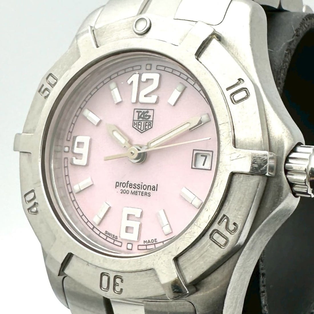 TAG HEUER Exclusive WN1319 Stainless Steel Quartz Watch with Pink Shell, Women's: --- Catalog ---Category: SizeWrist Size: 14cm / 5.51''Case Diameter: 28mm / 1.1''Category: DesignType: WristwatchGender: WomenColor (Dial): PinkMaterial (Band): Stainless steelMaterial (Case): Stainle