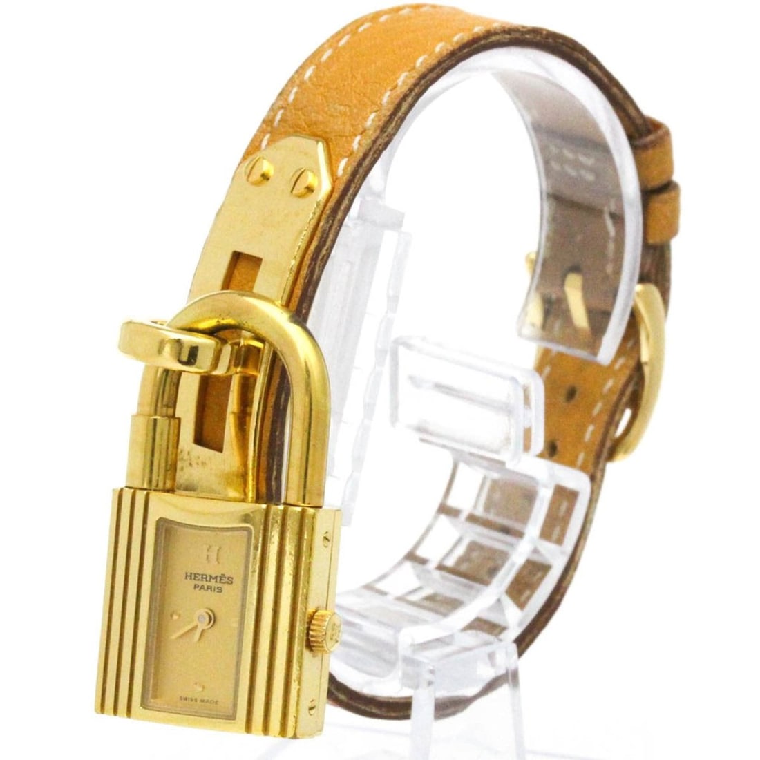 HERMES Kelly Watch Gold Plated Leather Quartz Ladies Watch: --- Catalog ---Category: SizeCase Diameter: 20mm / 0.79''Category: DesignType: WristwatchStyle: Dress/FormalGender: WomenColor (Dial): GoldMaterial (Band): LeatherMaterial (Case): Gold platedCategory: