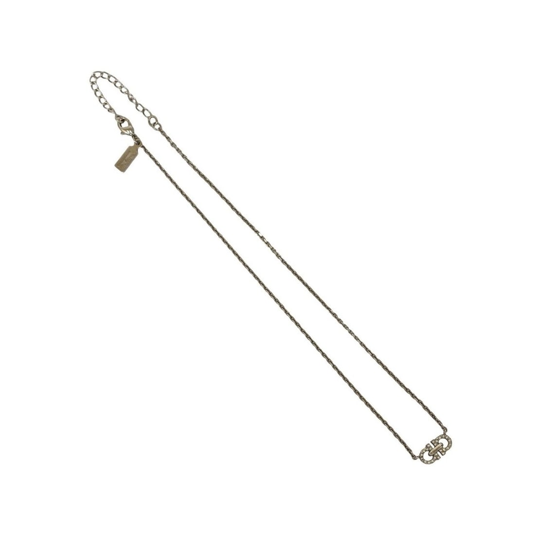 Salvatore Ferragamo Gancini motif plated rhinestone necklace in silver, item number 05218: --- Catalog ---Category: SizePendant Size: 8mm x 16mm / 0.31'' x 0.62''Neck Circumference: 47.5 cm / 18.7''Category: DesignColor: SilverGender: WomenMaterial: RhinestoneNecklace Type: NecklaceCategory