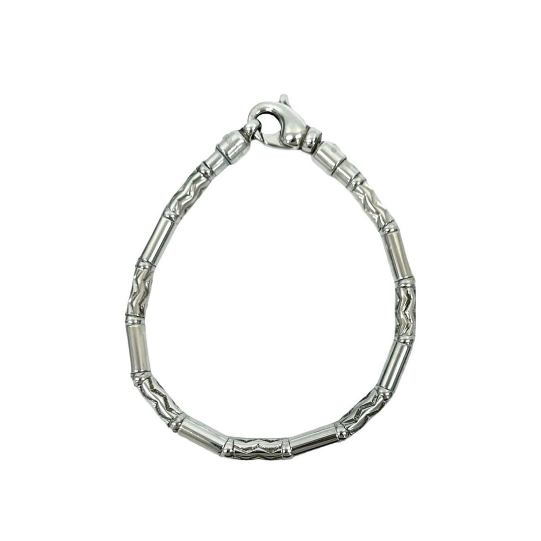 TIFFANY & Co. Tiffany Aztec Zigzag Bracelet in 925 Sterling Silver, 69962: --- Catalog ---Category: SizeLength: 19.5cm / 7.67''Category: DesignType: Charm braceletColor: SilverGender: WomenMaterial: Silver 925Category: GeneralBrand: Tiffany--- Item List ---Section: Condition