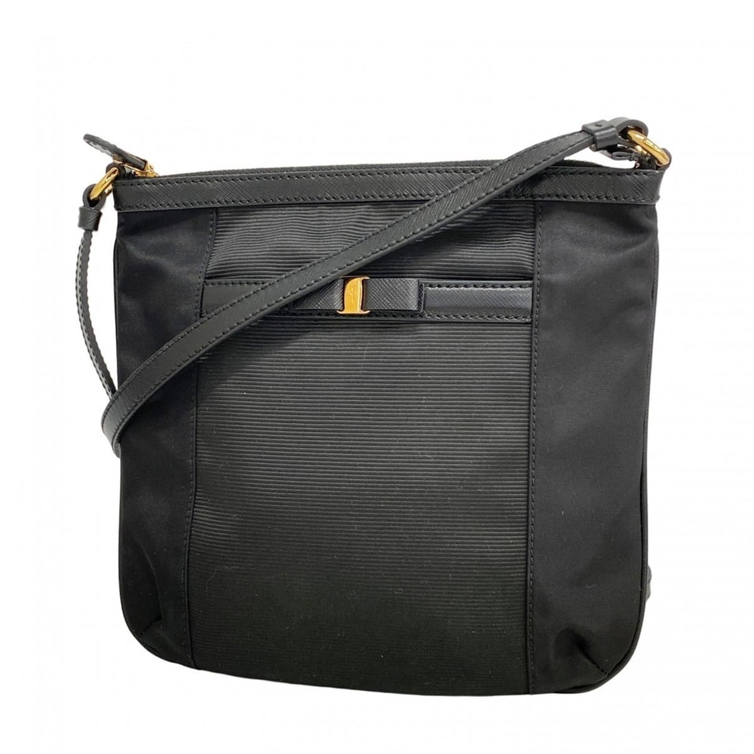 Salvatore Ferragamo Vara Shoulder Bag in Black Nylon for Women: --- Catalog ---Category: SizeSize (HxWxD): 21cm x 21cm x 2cm / 8.26'' x 8.26'' x 0.78''Category: DesignType: Shoulder bagColor: BlackGender: WomenMaterial: Nylon Hardware Color: GoldCategory: GeneralB