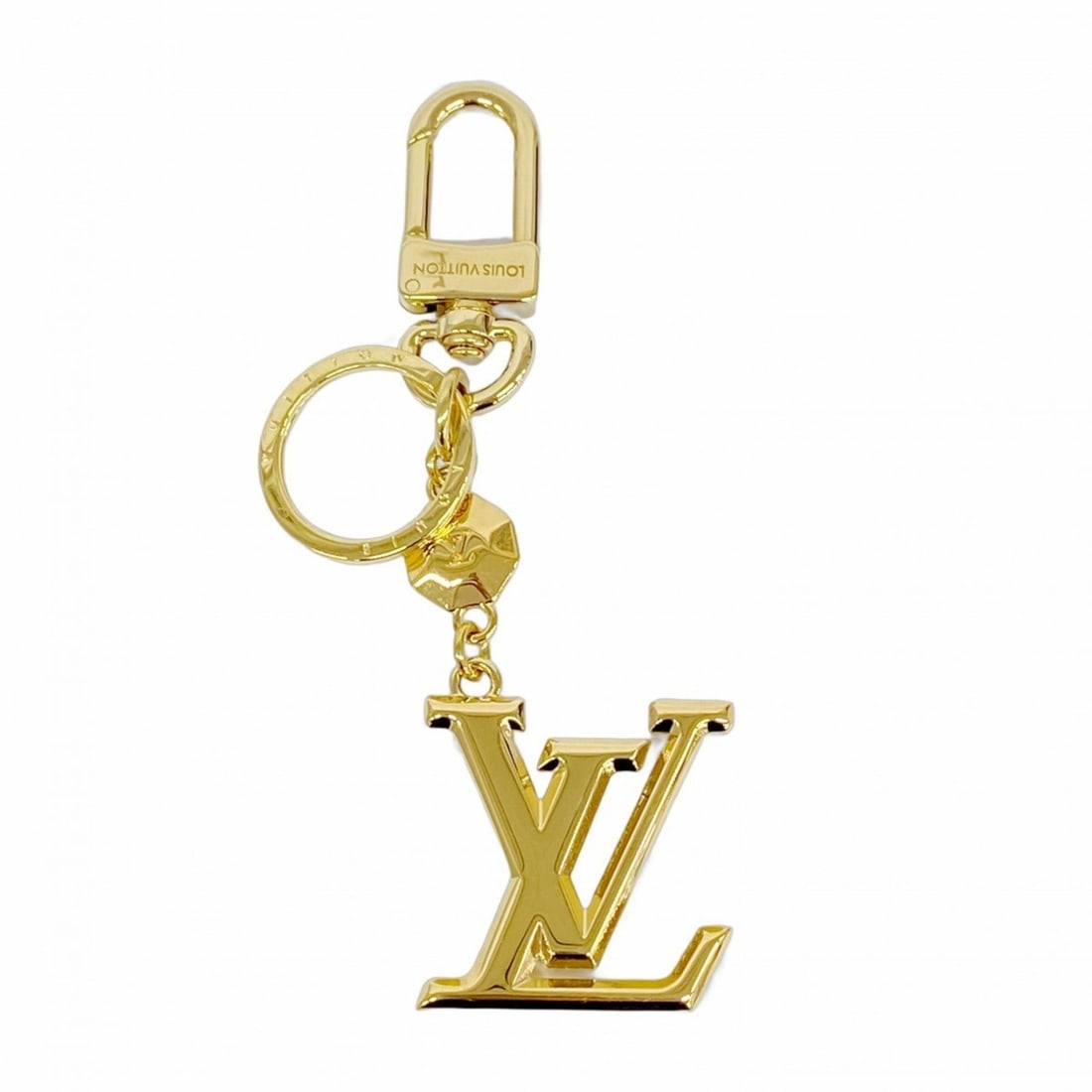 Louis Vuitton Keychain Charm LV Facet M65216 Gold Women's: --- Catalog ---Category: SizeSize (HxWxD): 13cm x 3.5cm x 5.00mm / 5.11'' x 1.37'' x 0.19''Category: DesignType: KeyringColor: GoldGender: WomenCategory: GeneralMPN: M65216Brand: Louis Vuitton--- Item