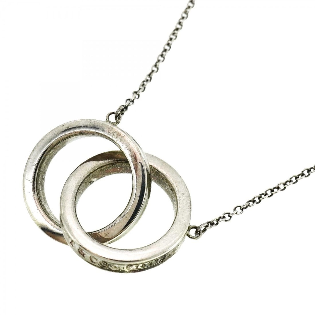 Tiffany Interlocking Necklace 1837 Silver 925 Women's: --- Catalog ---Category: SizePendant Size: 14.2mm x 23mm / 0.55'' x 0.9''Neck Circumference: 43.5 cm / 17.12''Category: DesignGender: WomenMaterial: Silver 925Necklace Type: NecklaceCategory: