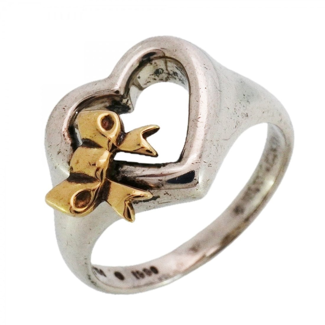 Tiffany Heart Ribbon Ring, 18K Yellow Gold and 925 Silver, Size 12.5, Women's: --- Catalog ---Category: SizeJP Size: 12.5US Size: 6.5Category: DesignType: Band ringGender: WomenMaterial: Silver 925, Yellow gold (18K)Category: GeneralBrand: Tiffany--- Item List ---Section: Condit
