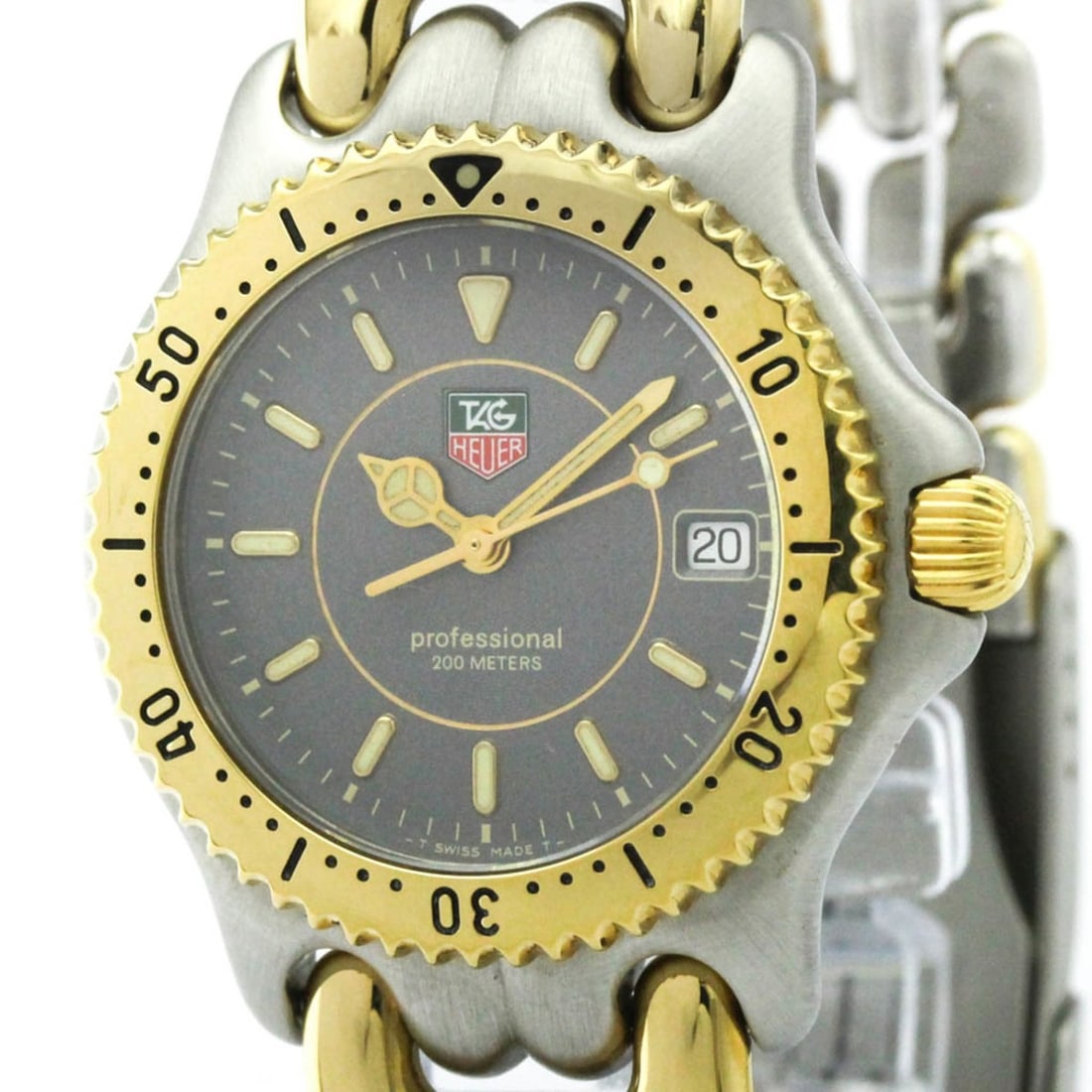 TAG HEUER Sel Professional Gold Plated Steel Mens Watch WG1220 Polished: --- Catalog ---Category: SizeCase Diameter: 34mm / 1.34''Category: DesignType: WristwatchStyle: Dress/FormalGender: MenColor (Dial): GrayMaterial (Band): Gold plated, Stainless steelMaterial (Case): G