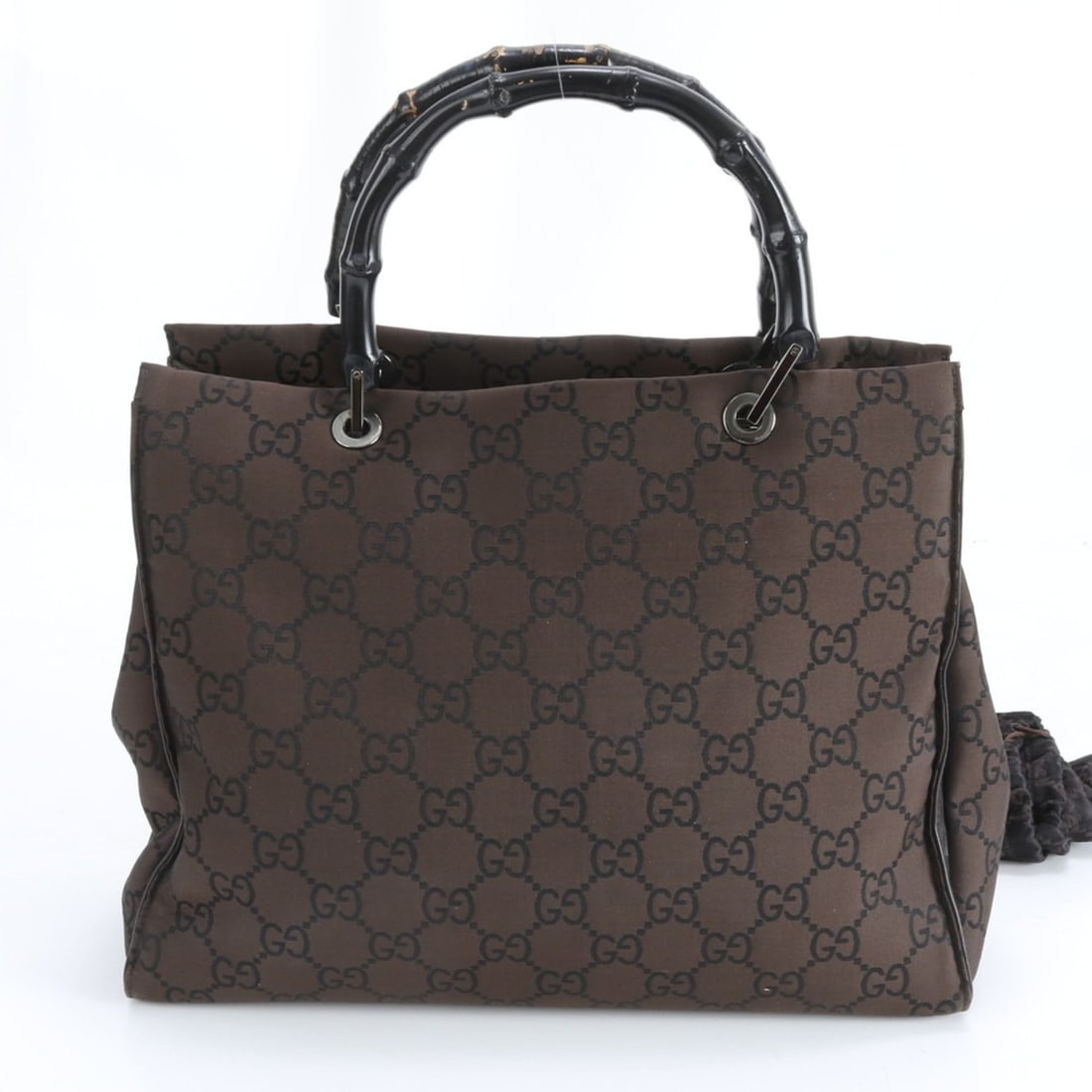 Gucci Bamboo GG Nylon 002-1010 Handbag Tote Brown Leather Women's: --- Catalog ---Category: SizeSize (HxWxD): 27cm x 35cm x 13cm / 10.62'' x 13.77'' x 5.11''Handle Length: 37cm / 14.56''Category: DesignType: HandbagColor: BrownGender: WomenClosure: OpenMaterial: Bamb