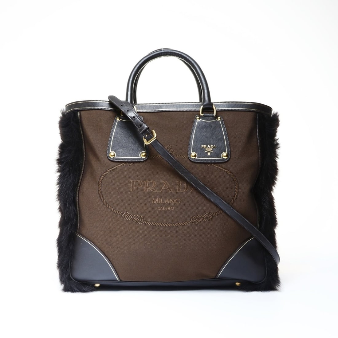Prada Canvas Jacquard Logo Fur 2-Way Tote Bag Brown WS24995: --- Catalog ---Category: SizeHandle Drop: 14.00cm / 5.51''Size (HxWxD): 34.5cm x 45cm x 11cm / 13.58'' x 17.71'' x 4.33''Strap Length: 100cm / 39.36''Category: DesignType: Tote bagColor: BrownGender: