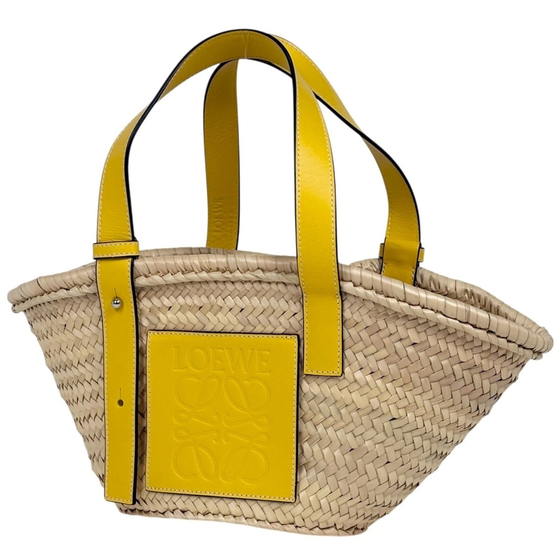 LOEWE Small Anagram Palm Leaf Basket Bag in Natural Yellow.: --- Catalog ---Category: SizeSize (HxWxD): 17.5cm x 18.5cm x 12cm / 6.88'' x 7.28'' x 4.72''Category: DesignType: Basket, HandbagColor: YellowGender: WomenMaterial: Raffia , Leather Category: GeneralB