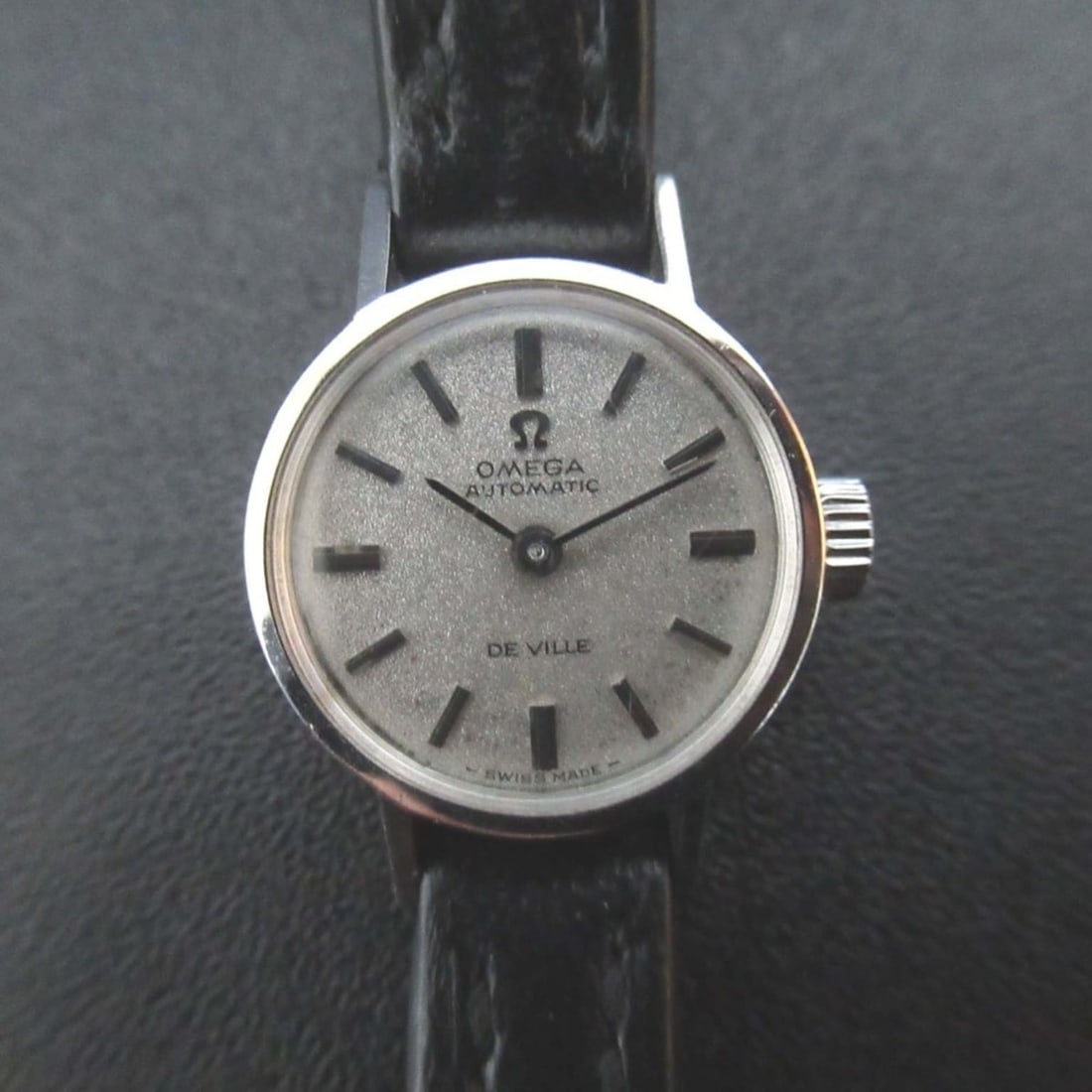 OMEGA De Ville Automatic Two-Hand Women's Watch with Stainless Steel and Leather Strap, Black: --- Catalog ---Category: SizeWrist Size: 14.5cm - 17.5cm / 5.7'' - 6.88''Case Diameter: 17mm / 0.67''Category: DesignType: WristwatchGender: WomenColor (Dial): BlackCategory: GeneralBrand: OmegaCatego