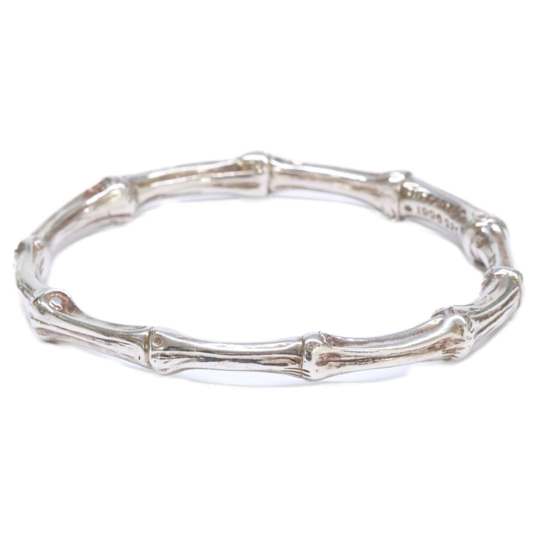 TIFFANY & Co. 1996 925 Bamboo Bangle Silver for Women: --- Catalog ---Category: SizeLength: 19.5cm / 7.67''Category: DesignType: BangleColor: SilverGender: WomenMaterial: Silver 925Category: GeneralLine: BambooBrand: Tiffany--- Item List ---Section: Condi