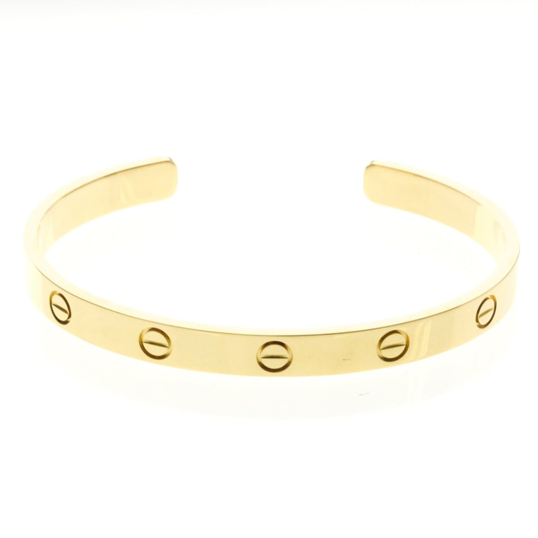 Cartier Love Open Bangle Yellow Gold (18K) No Stone Bangle Gold: --- Catalog ---Category: SizeSize: 18Width: 6.1cm / 2.4''Weight: 24.7g / 0.87oz.Category: DesignType: BangleColor: GoldMetal: GoldStone: No StoneStyle: FashionGender: Men,WomenMaterial: Yellow gold (1