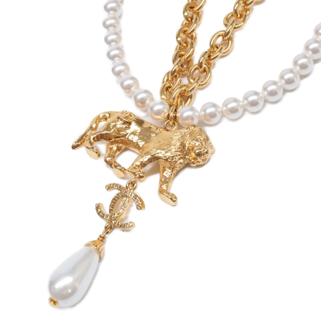 CHANEL B22A Faux Pearl Lion Motif Coco Mark Double-Strand Necklace in Gold for Women: --- Catalog ---Category: SizePendant Size: 60mm x 35mm / 2.36'' x 1.37''Neck Circumference: 46 cm / 18.11''Category: DesignColor: GoldGender: WomenMaterial: MetalNecklace Type: NecklaceCategory: Gener