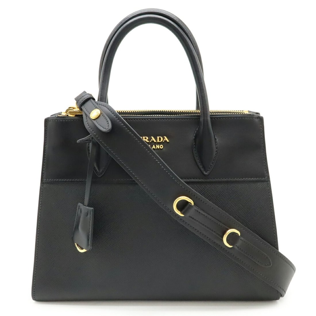 PRADA Paradigm Handbag/Shoulder Bag in Saffiano Leather, Nero Black, 1BA103: --- Catalog ---Category: SizeWeight: 730g / 1.6lb.Size (HxWxD): 21cm x 27.5cm x 13cm / 8.26'' x 10.82'' x 5.11''Strap Length: 93cm / 36.61''Category: DesignType: Handbag, Shoulder bagColor: Black, Ner