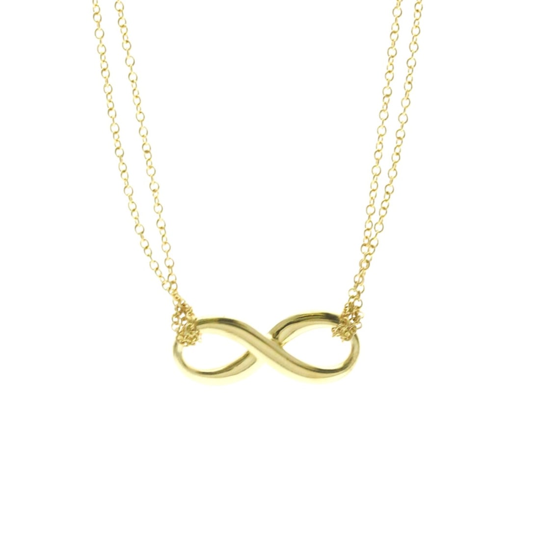 Tiffany Infinity Double Chain Necklace Yellow Gold (18K) No Stone Women,Men Fashion Pendant Necklace: --- Catalog ---Category: SizeWeight: 4.6g / 0.16oz.Pendant Size: 8.2mm x 20.2mm / 0.32'' x 0.79''Neck Circumference: 40.5 cm / 15.94''Category: DesignColor: GoldMetal: GoldStone: No StoneStyle: Fashio