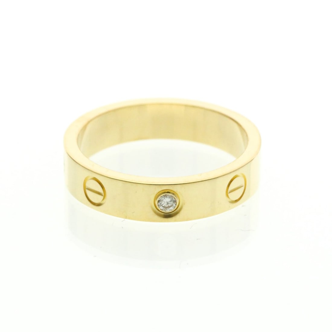 Cartier Mini Love Ring 1P Diamond Yellow Gold (18K) Fashion Diamond Band Ring Gold: --- Catalog ---Category: SizeWidth: 3.9mm / 0.15''Weight: 4.3g / 0.15oz.JP Size: 9US Size: 4 3/4Brand Size: 49Category: DesignType: Band ringColor: GoldMetal: GoldStone: DiamondStyle: FashionGender: M
