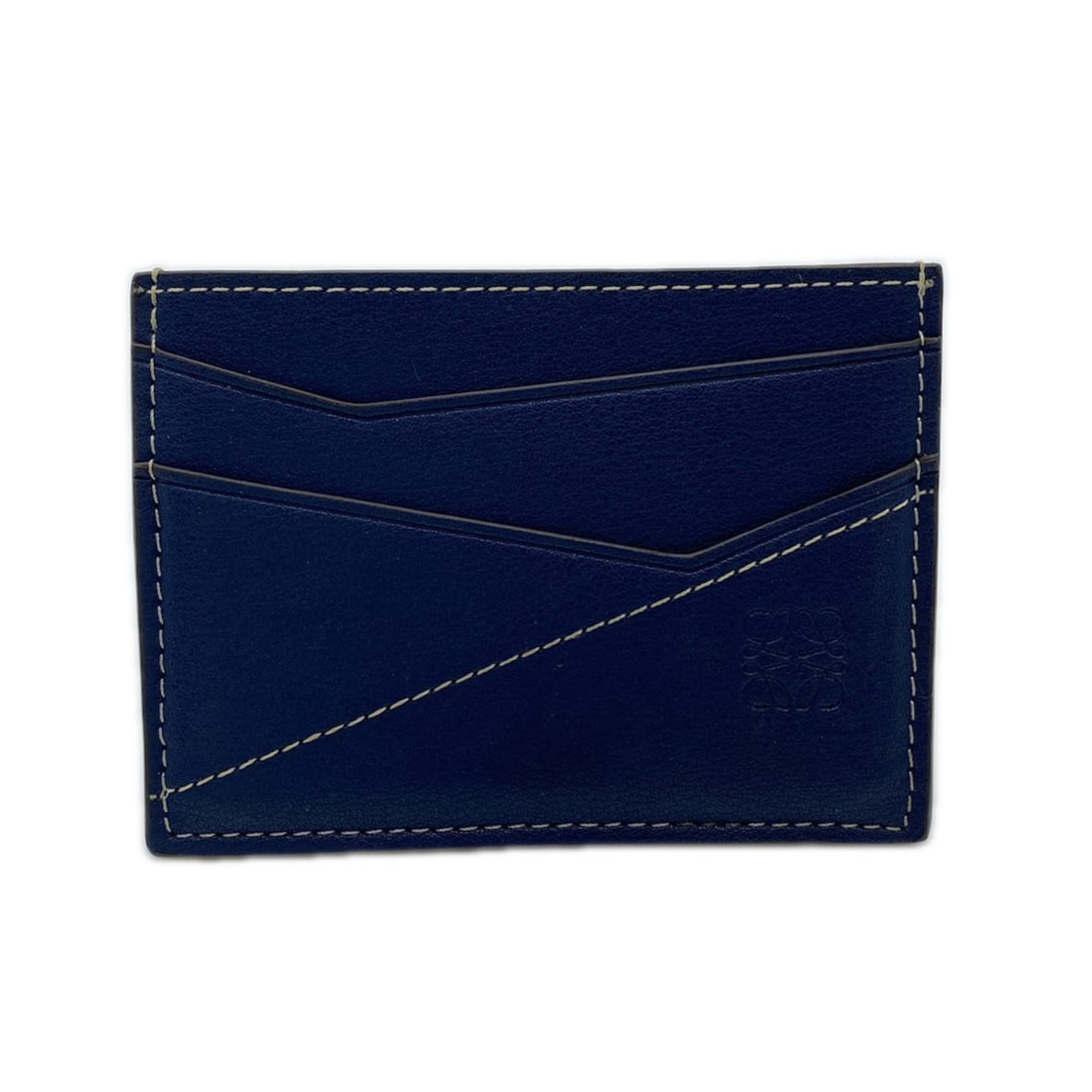 LOEWE Puzzle Plain Card Holder in Smooth Calf, Navy Leather, Women's: --- Catalog ---Category: DesignType: Card caseColor: NavyGender: WomenClosure: OpenMaterial: Leather Category: GeneralBrand: LoeweCategory: Physical PropertiesWeight: 26g / 0.91oz.Size (HxWxD): 7.5cm