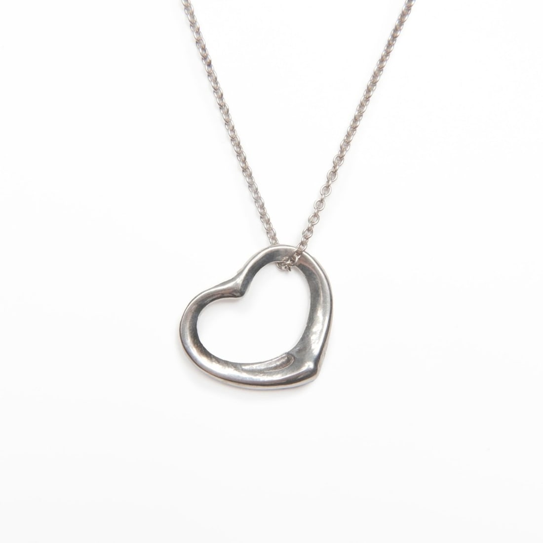 Tiffany & Co. 925 Open Heart Necklace in Silver, WS23973: --- Catalog ---Category: SizePendant Size: 20mm x 17mm / 0.78'' x 0.66''Neck Circumference: 42 cm / 16.53''Category: DesignColor: SilverGender: WomenNecklace Type: NecklaceCategory: GeneralBrand: Tiff