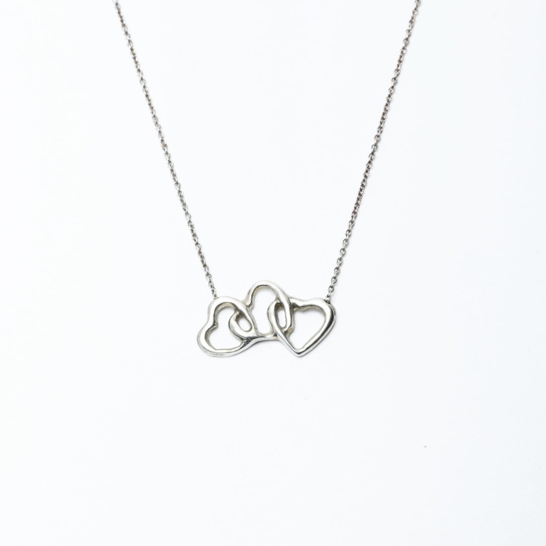 Tiffany & Co. Triple Heart Necklace in Silver, WS24311: --- Catalog ---Category: SizeNeck Circumference: 40 cm / 15.74''Category: DesignColor: SilverGender: WomenNecklace Type: NecklaceCategory: GeneralBrand: TiffanyCountry of Origin: USA--- Item List ---S