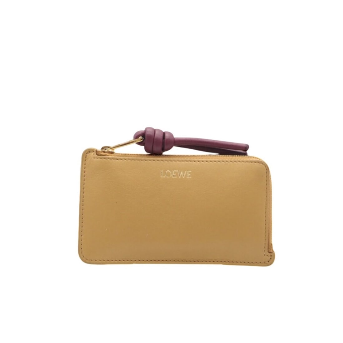 LOEWE Shiny Napa Calf Knot Coin Card Holder in Sahara Crimson (CEM1Z40X02) - Yellow and Bordeaux: --- Catalog ---Category: SizeWeight: 40g / 1.41oz.Size (HxWxD): 7.5cm x 12.5cm x 1cm / 2.95'' x 4.92'' x 0.39''Category: DesignType: Coin purse/coin caseColor: Bordeaux, YellowGender: WomenClosure: Zi