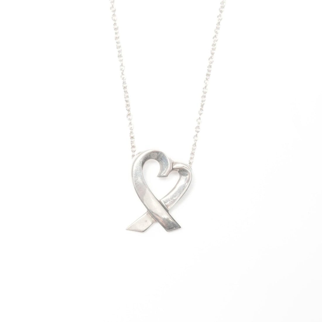 Tiffany & Co. 925 Wrapped Heart Necklace in Silver, WS24032: --- Catalog ---Category: SizePendant Size: 15mm x 10mm / 0.59'' x 0.39''Neck Circumference: 40 cm / 15.74''Category: DesignColor: SilverGender: WomenNecklace Type: NecklaceCategory: GeneralBrand: