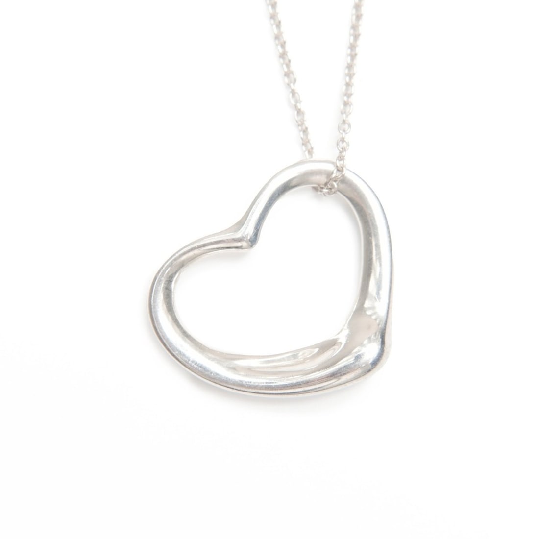 Tiffany & Co. Open Heart 925 Silver Necklace WS24021: --- Catalog ---Category: SizePendant Size: 20mm x 20mm / 0.78'' x 0.78''Neck Circumference: 40 cm / 15.74''Category: DesignColor: SilverGender: WomenNecklace Type: NecklaceCategory: GeneralBrand: Tiff