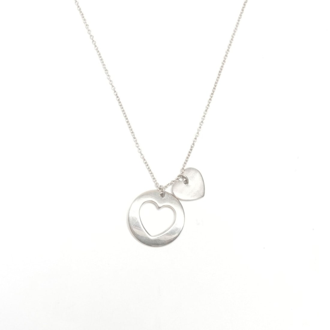 Tiffany & Co. Stencil Heart Necklace in 925 Sterling Silver (WS24583): --- Catalog ---Category: SizePendant Size: 14mm x 14mm / 0.55'' x 0.55''Neck Circumference: 40 cm / 15.74''Category: DesignColor: SilverGender: WomenNecklace Type: NecklaceCategory: GeneralBrand: Tiff