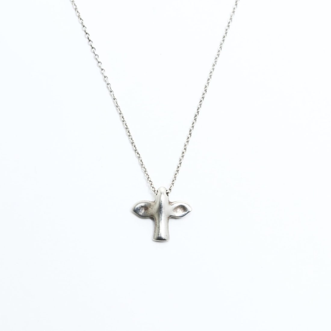Tiffany & Co. Bird 925 Silver Necklace WS26033: --- Catalog ---Category: DesignColor: ClearNecklace Type: NecklaceCategory: GeneralLine: AppleBrand: Tiffany--- Item List ---Section: ConditionRanking: Rank NS Never used / display itemCondition: Used